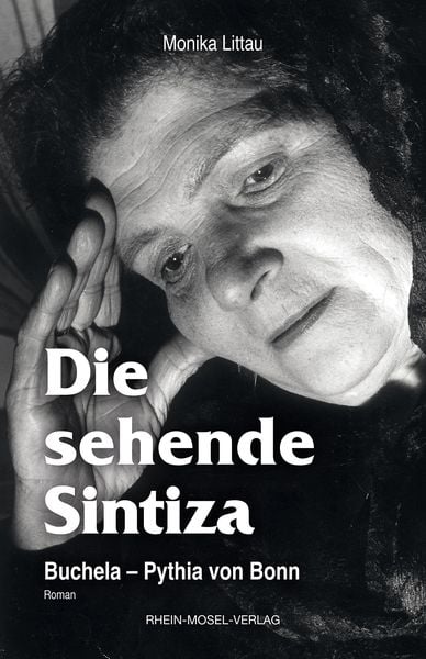 NEU AUFGELEGT: Monika Littau: „Die sehende Sintiza: Buchela – Pythia von Bonn“ [I dikaschkimi Sintiza], Rhein-Mosel-Verlag: Zell/Mosel 2024 (Taschenbuch, 334 Seiten/riktscha). ISBN-10:‎ 3898014266 / ISBN-13: 978-3898014267